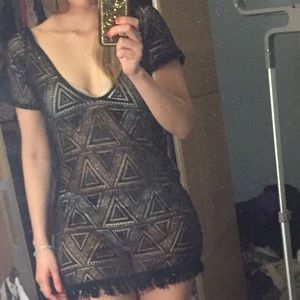 Cutout black cover up with fringe